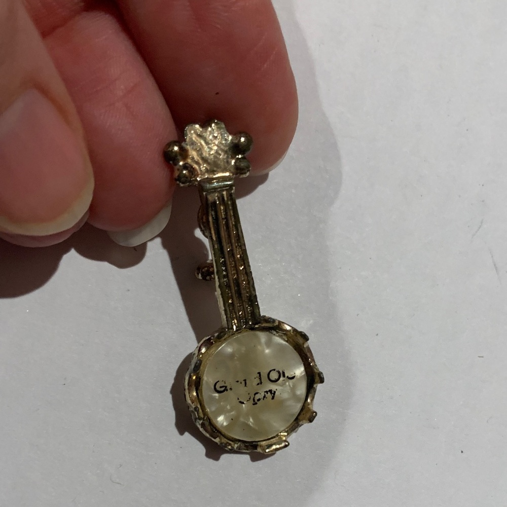 Vintage Grand Ole Opry mother of pearl banjo aged gold tone metal pin 1.5” long